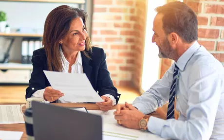 two people in a meeting